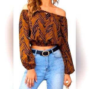 Boutique navy blue and brown off shoulder top! New